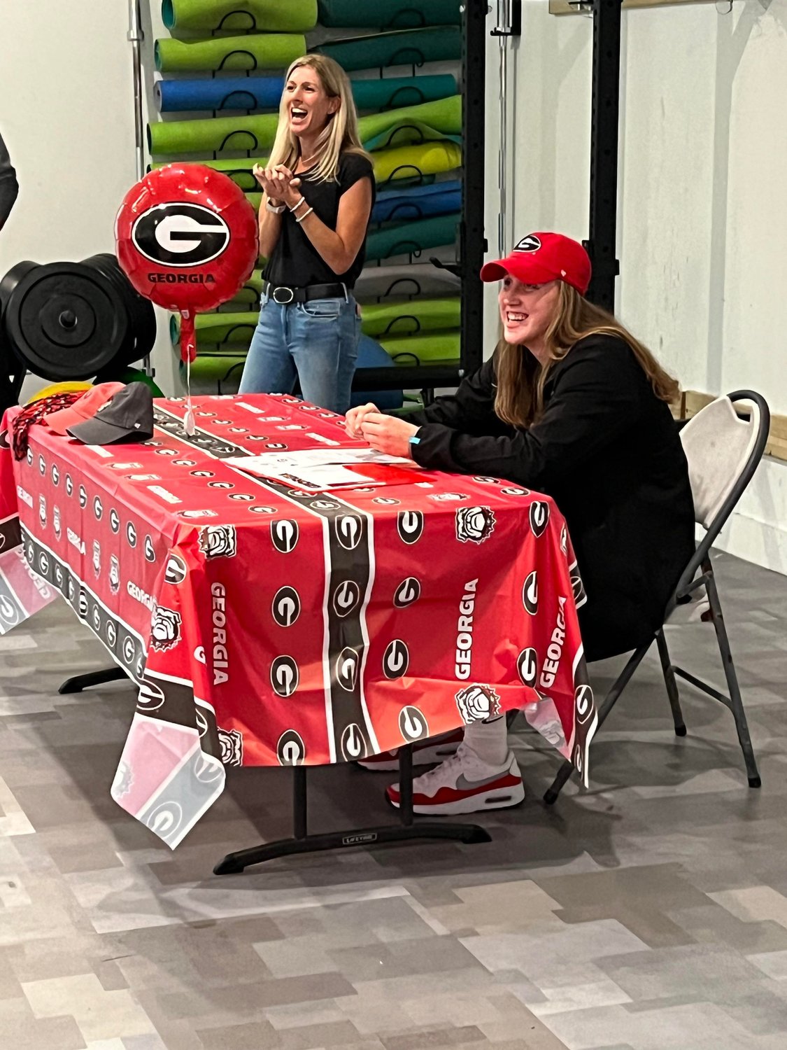 Fresh off a state title, Annie Wholgemuth signed a swimming scholarship to the University of Georgia.